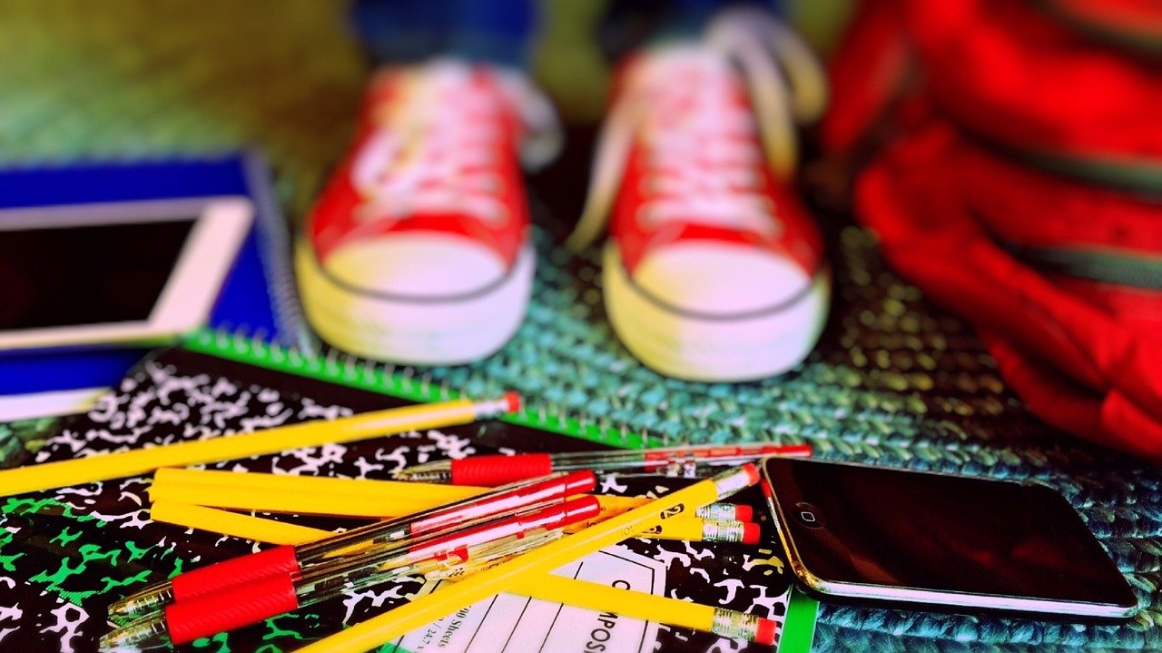 Student with pencil and notebook