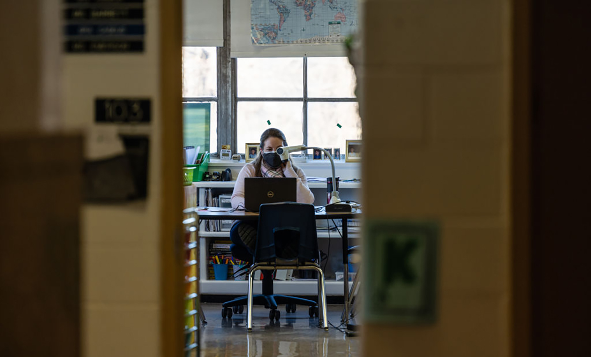 Teacher at desk